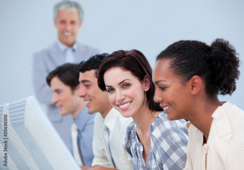 Positive business team at work with their manager Positive business team at work with their manager