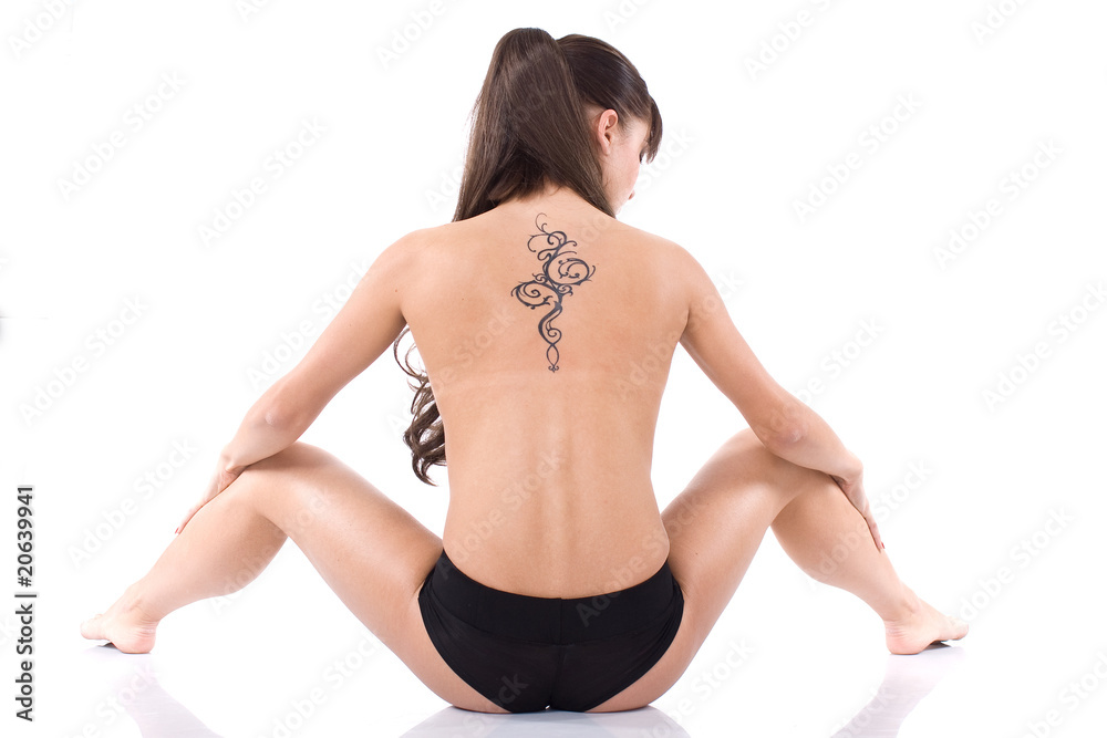Obraz premium Nude girl with tattoo