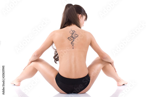 Nude girl with tattoo