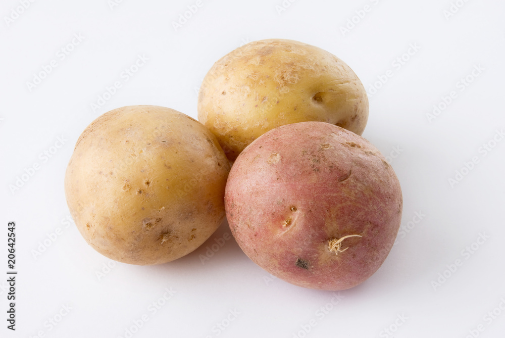 Three potatoes isolated on a white background Three potatoes isolated on a white background