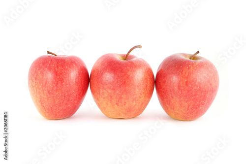 Three Red Apples on white background