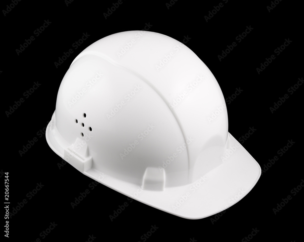 Fototapeta premium White hard hat isolated on black