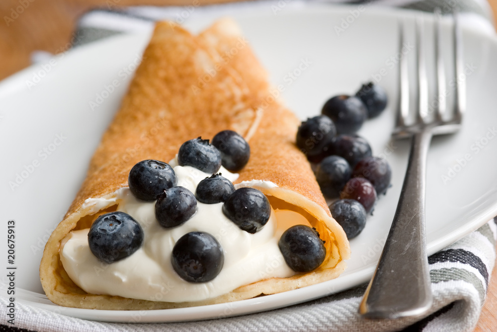 Pancake with fresh blueberries and cream Pancake with fresh blueberries and cream