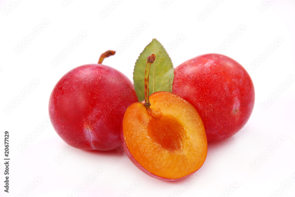 plums isolated on white plums isolated on white