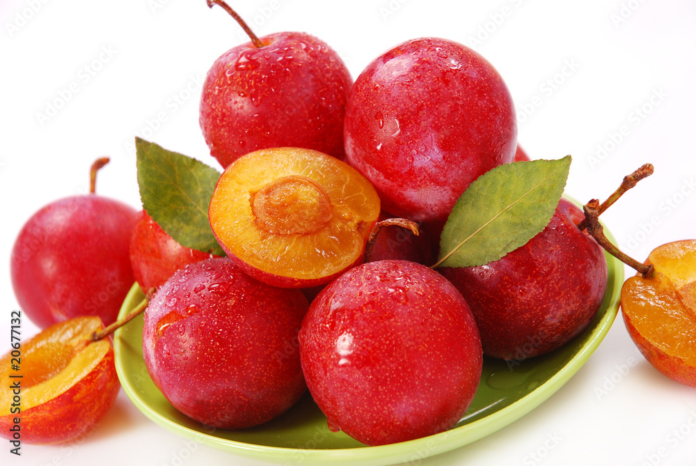 plums isolated on white plums isolated on white