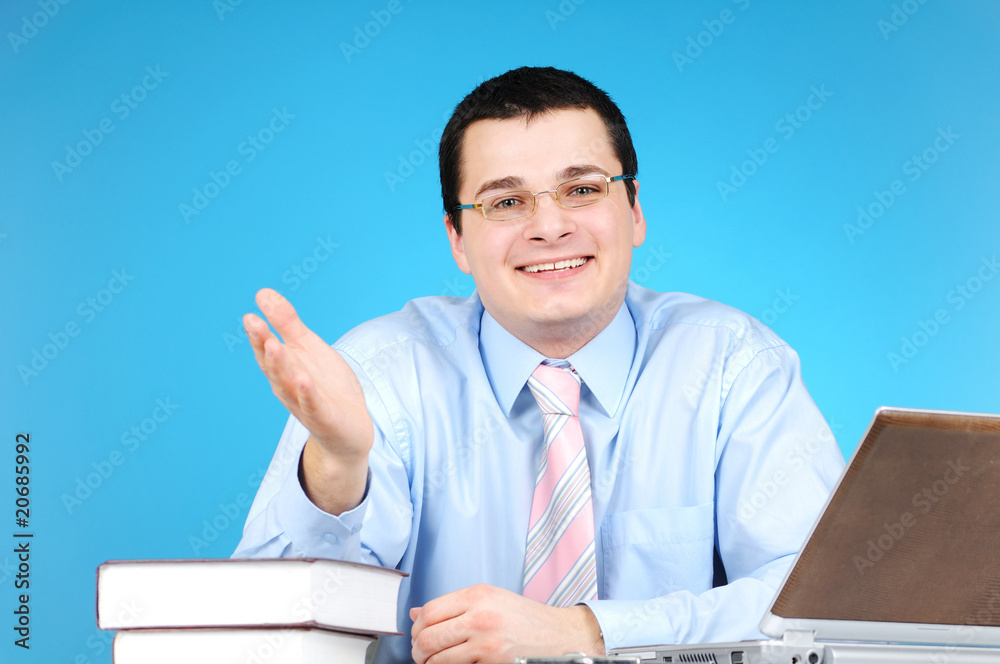 Cheerful engineer at work on blue background Cheerful engineer at work on blue background