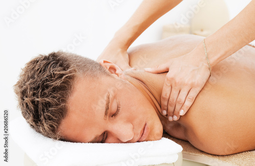 Young man getting spa treatment