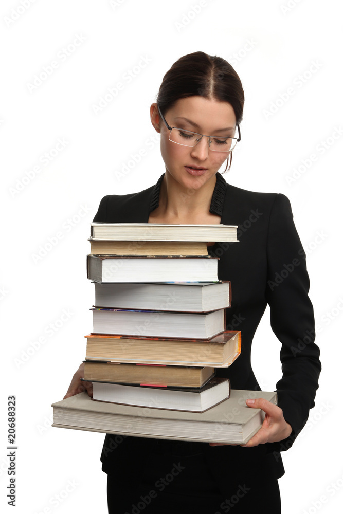 girl holding a large pile of books girl holding a large pile of books