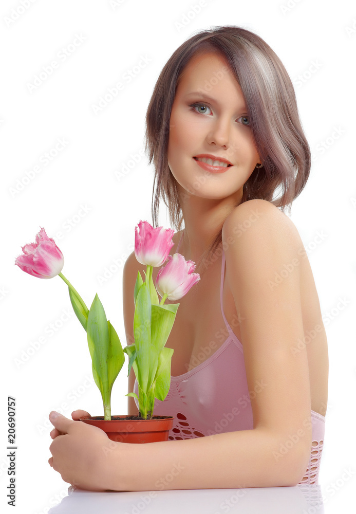 studio portrait of a beautiful girl with flowers studio portrait of a beautiful girl with flowers