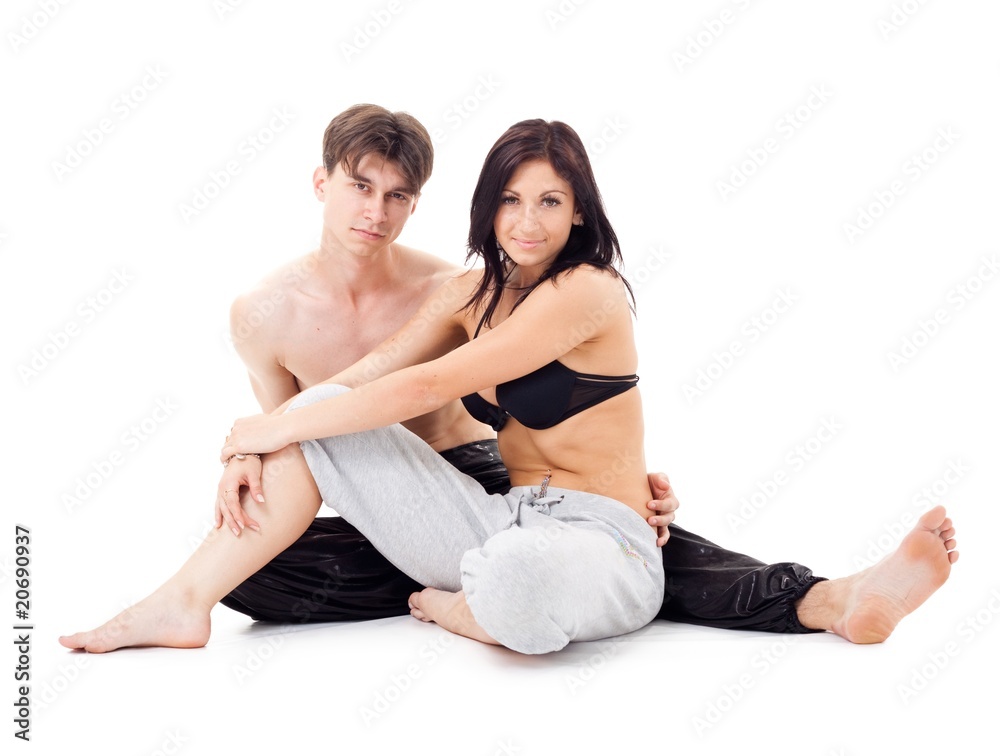 couple sitting on a white background couple sitting on a white background