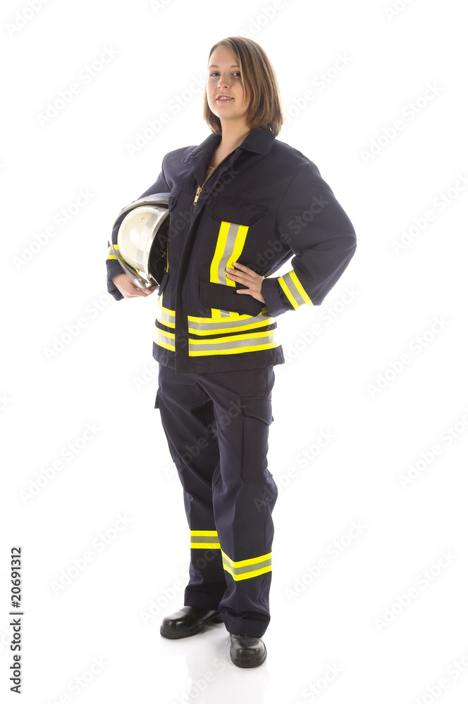 Junge Feuerwehrfrau in Uniform Junge Feuerwehrfrau in Uniform