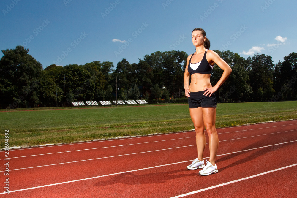young woman on a running track