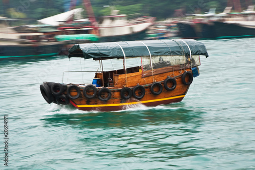 Photography boat cruise with traditional wooden junk in Aberdeen, Hongkongs