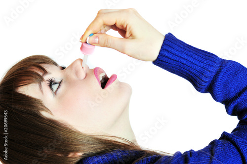 injecting drops into the nose