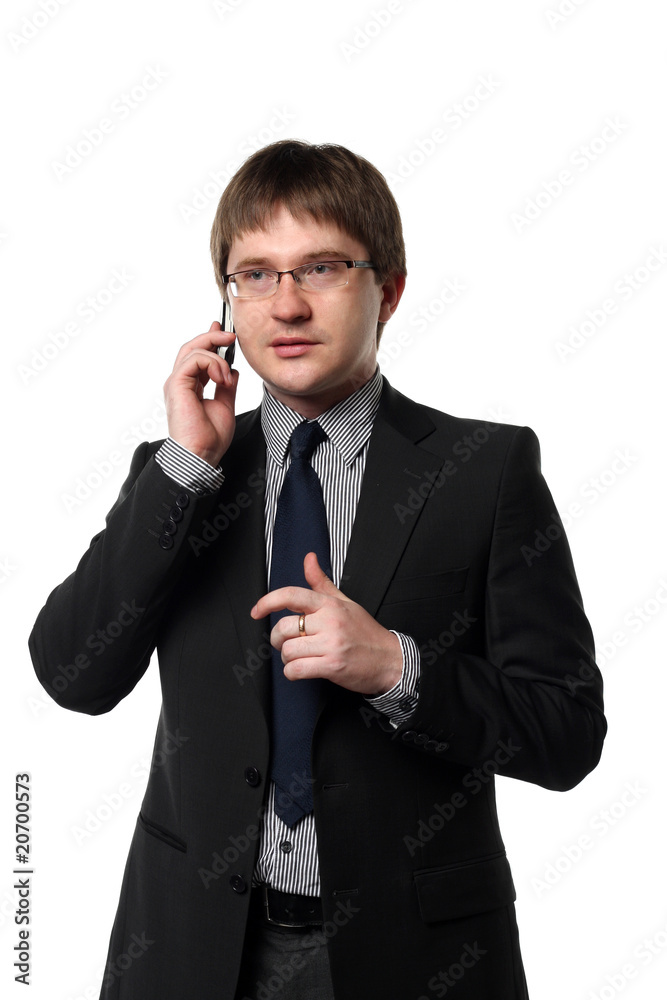 Portrait of a young manager in black suit communicating Portrait of a young manager in black suit communicating