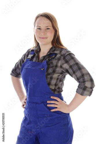 Junge Frau, Mädchen im Blaumann, stolz