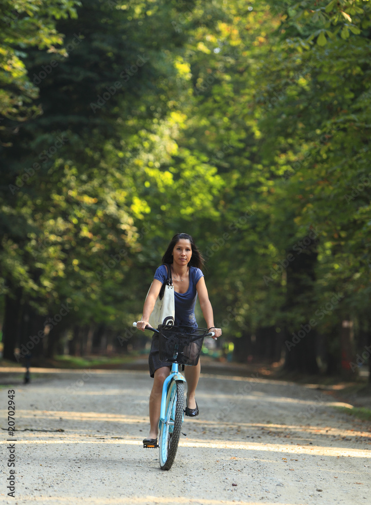 Woman riding a bicycle Woman riding a bicycle