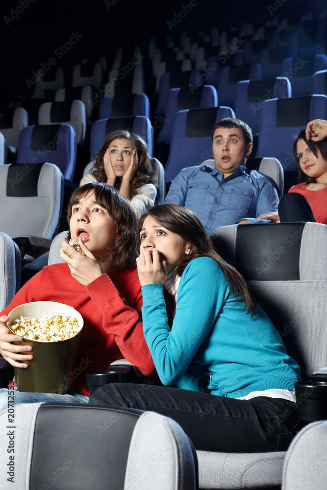 Fototapeta premium Young men at cinema