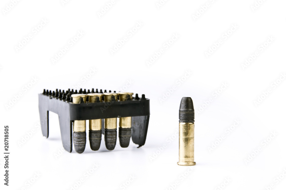 Bullets on the white surface