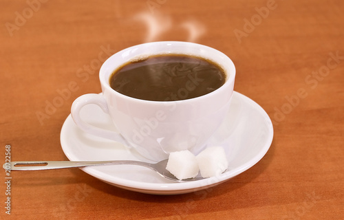 Close-up of white cup of coffee