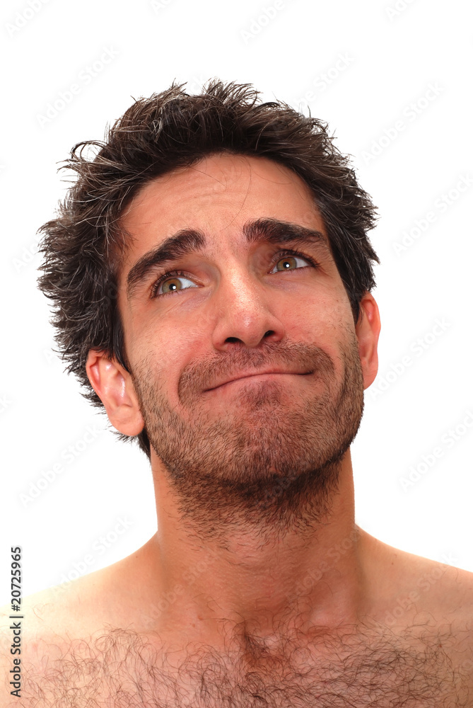 Obraz premium Young man thinking with silly expression