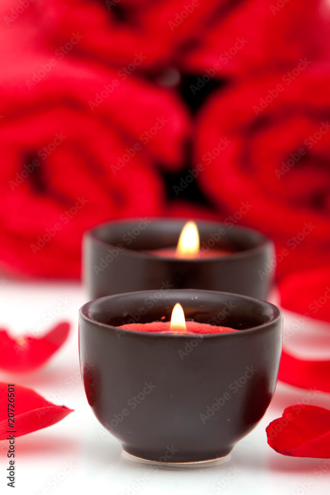 Spa candles, towels, rose petals