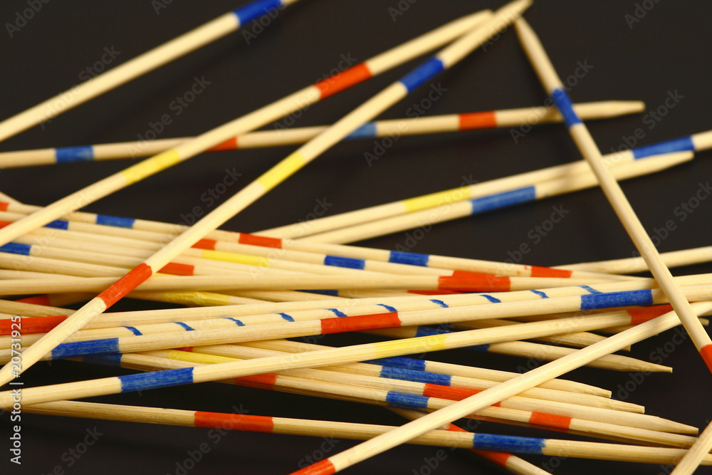 small sticks on the black background small sticks on the black background