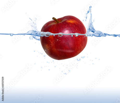 red apple in the water