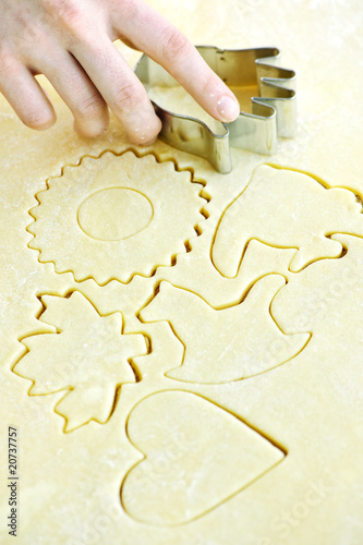 Cookie cutter and dough photo