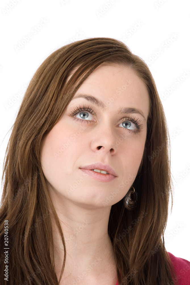 portrait of a young woman looking up isolated on white backgroun