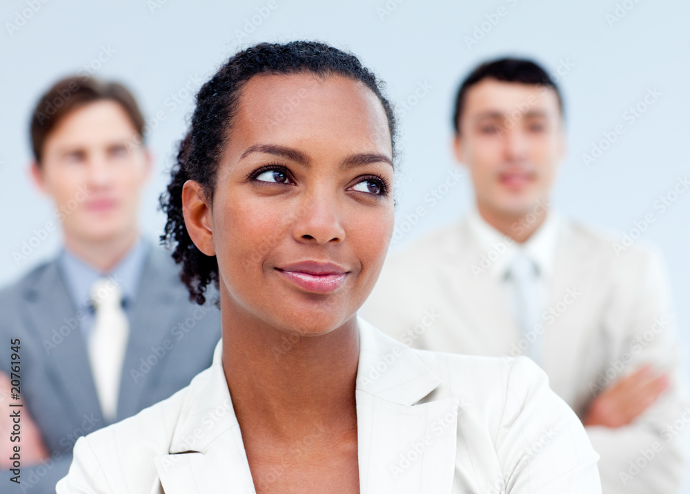 Charming business people standing with folded arms Charming business people standing with folded arms