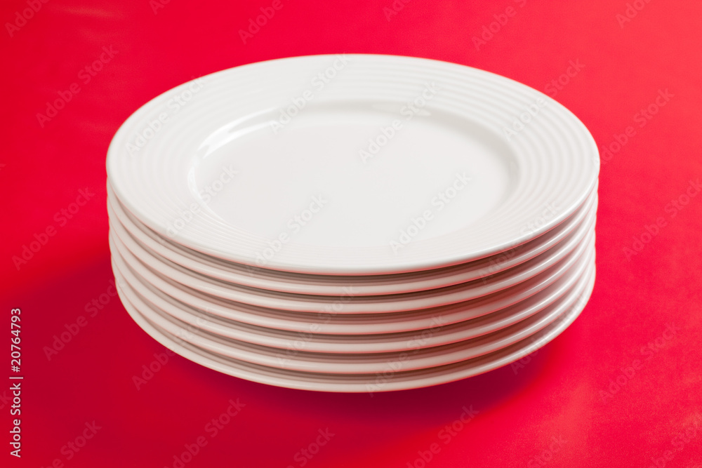 white plate on red background white plate on red background