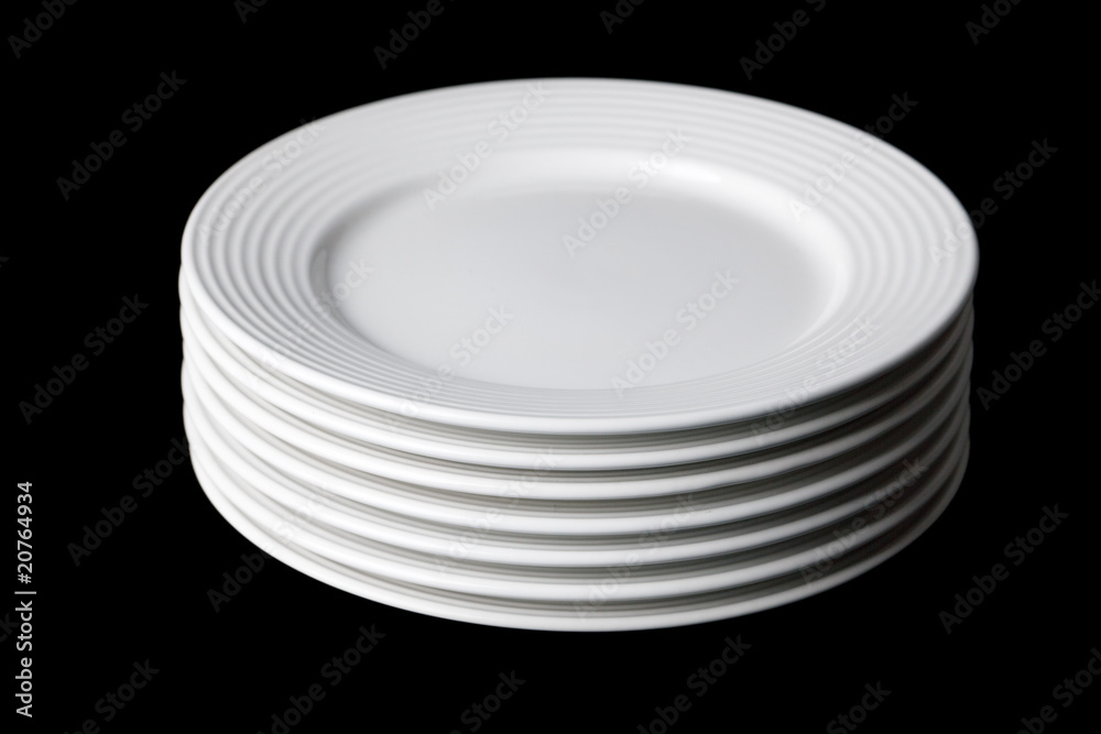 white plate on black background white plate on black background