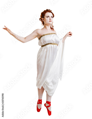 Girl dressed in greek costume dancing on white