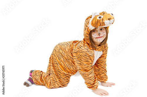 little girl wearing tiger costume isolated on white