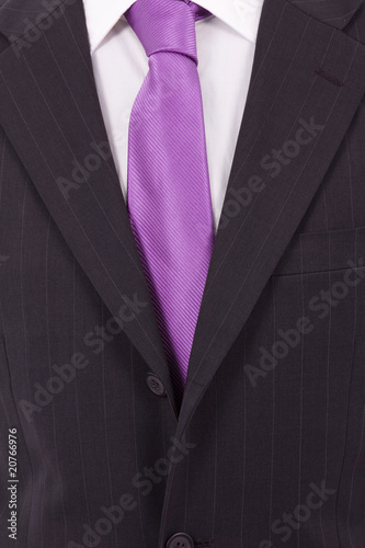 detail of a Business man Suit with violet tie