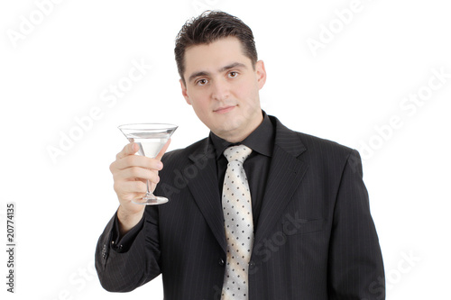 Young businessman with a drink isolated on white background