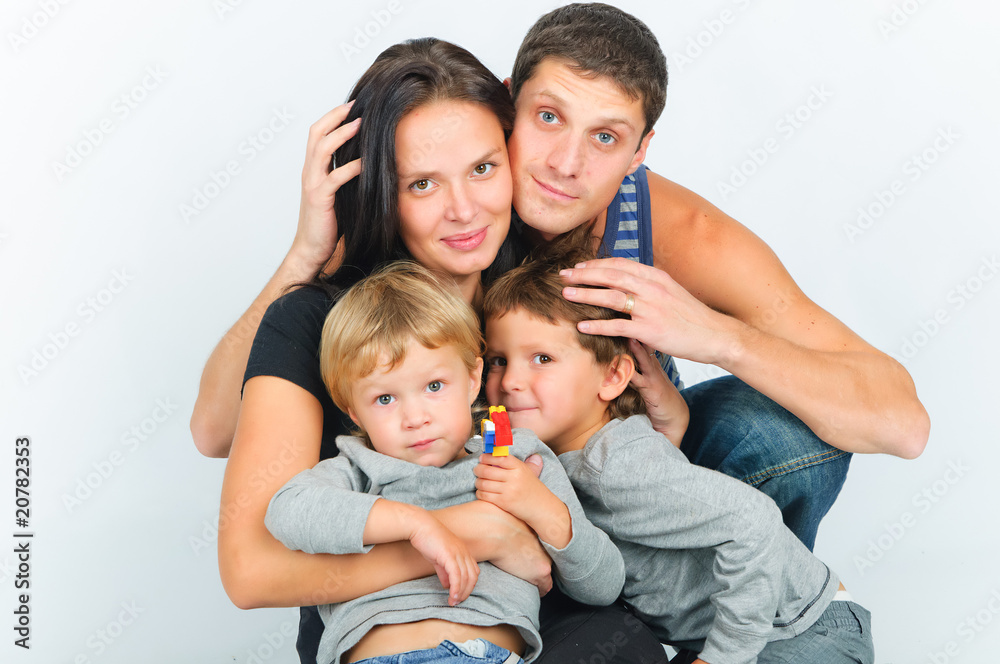 portrait of happy young family with two sons portrait of happy young family with two sons