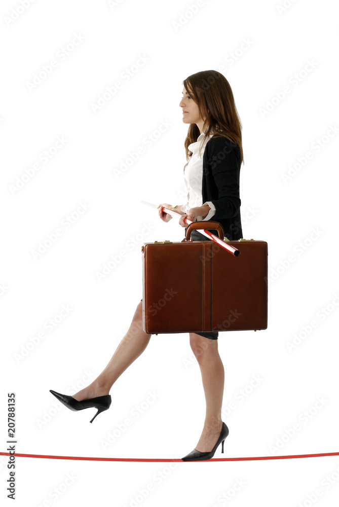 business concept: femme d'affaires funambule business concept: femme d'affaires funambule