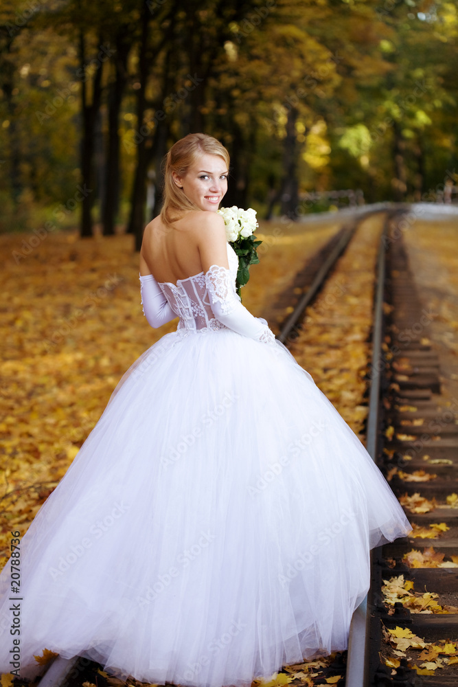Beautiful young bride on a railways Beautiful young bride on a railways