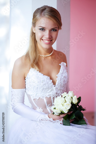 Beautiful young bride in a park