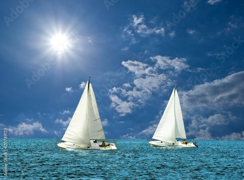 Fototapeta Naklejka Na Ścianę i Meble -  two white sail boats in a sea
