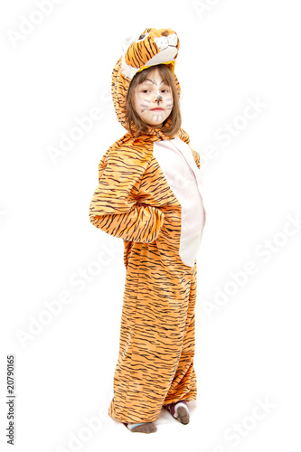 little girl wearing tiger costume isolated on white