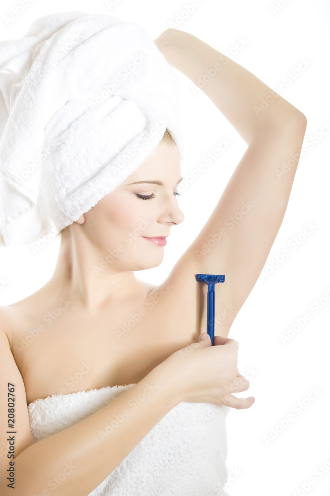 close-up portrait of Young beautiful woman shaving close-up portrait of Young beautiful woman shaving
