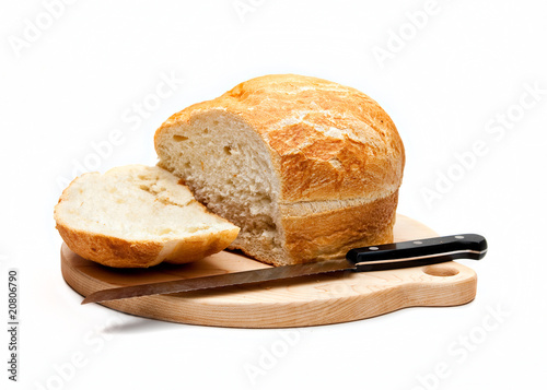 sliced fresh bread on board