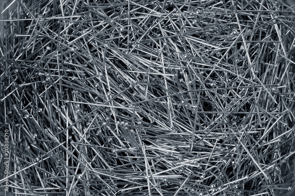 Background of steel many dressmaker pins Background of steel many dressmaker pins