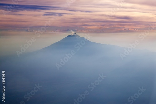 Fototapeta Naklejka Na Ścianę i Meble -  Popocatepetl volcano Mexico DF city aerial view