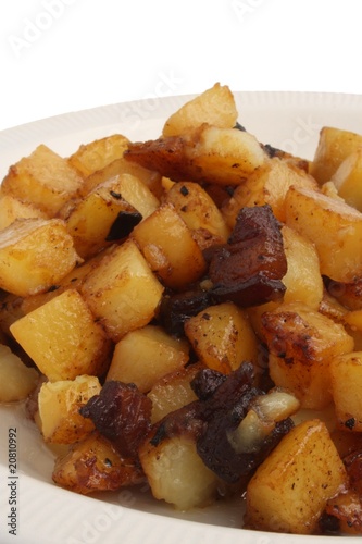 Fried potatoes with caramelized pork