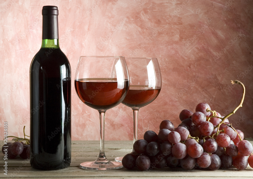 Fototapeta premium red wine bottle and glasses background