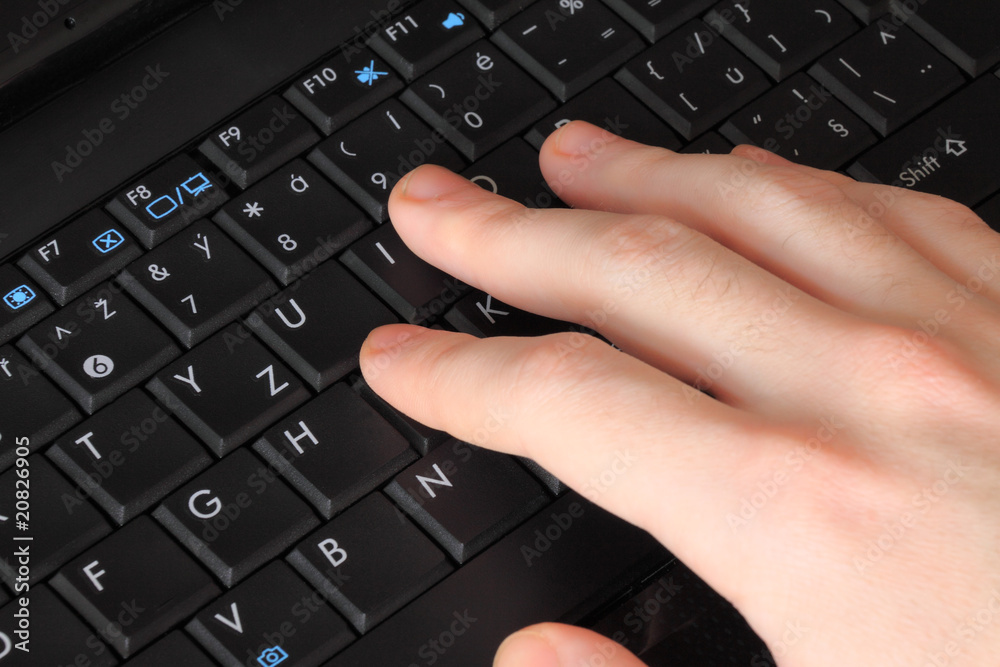 The businessman's Hand with Laptop Computer The businessman's Hand with Laptop Computer
